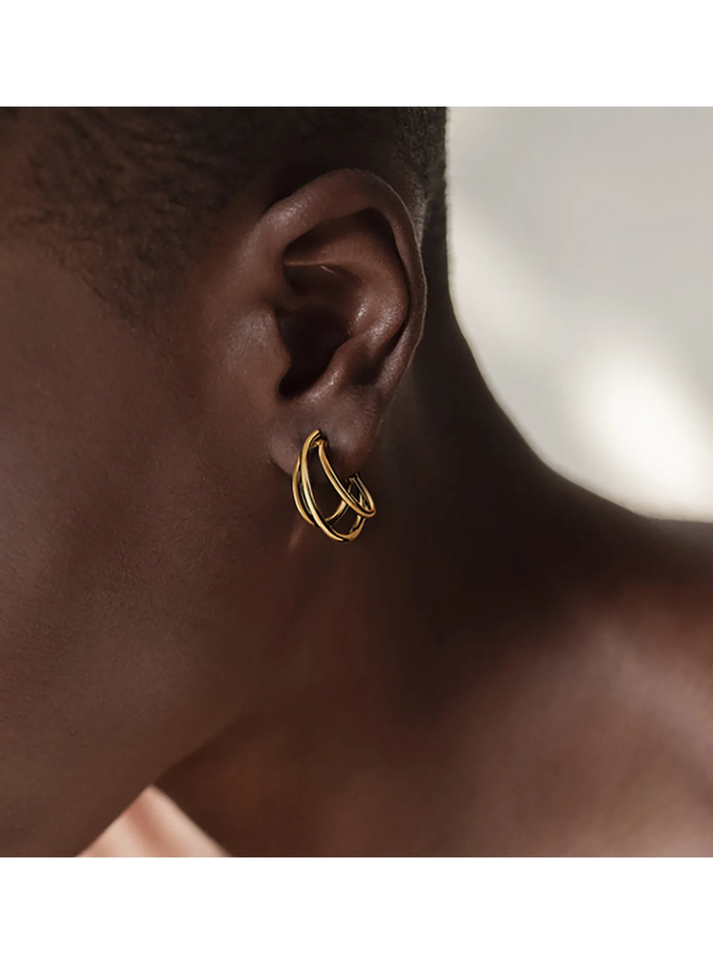 Boucles d'oreilles créoles Lotus Silver triple dorée