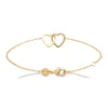 Bracelet Brillaxis plaqué or coeurs entrelacés