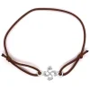 Bracelet croix basque argent sur élastique marron