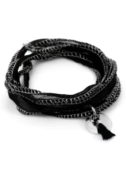 Médaille acier et pompon noir