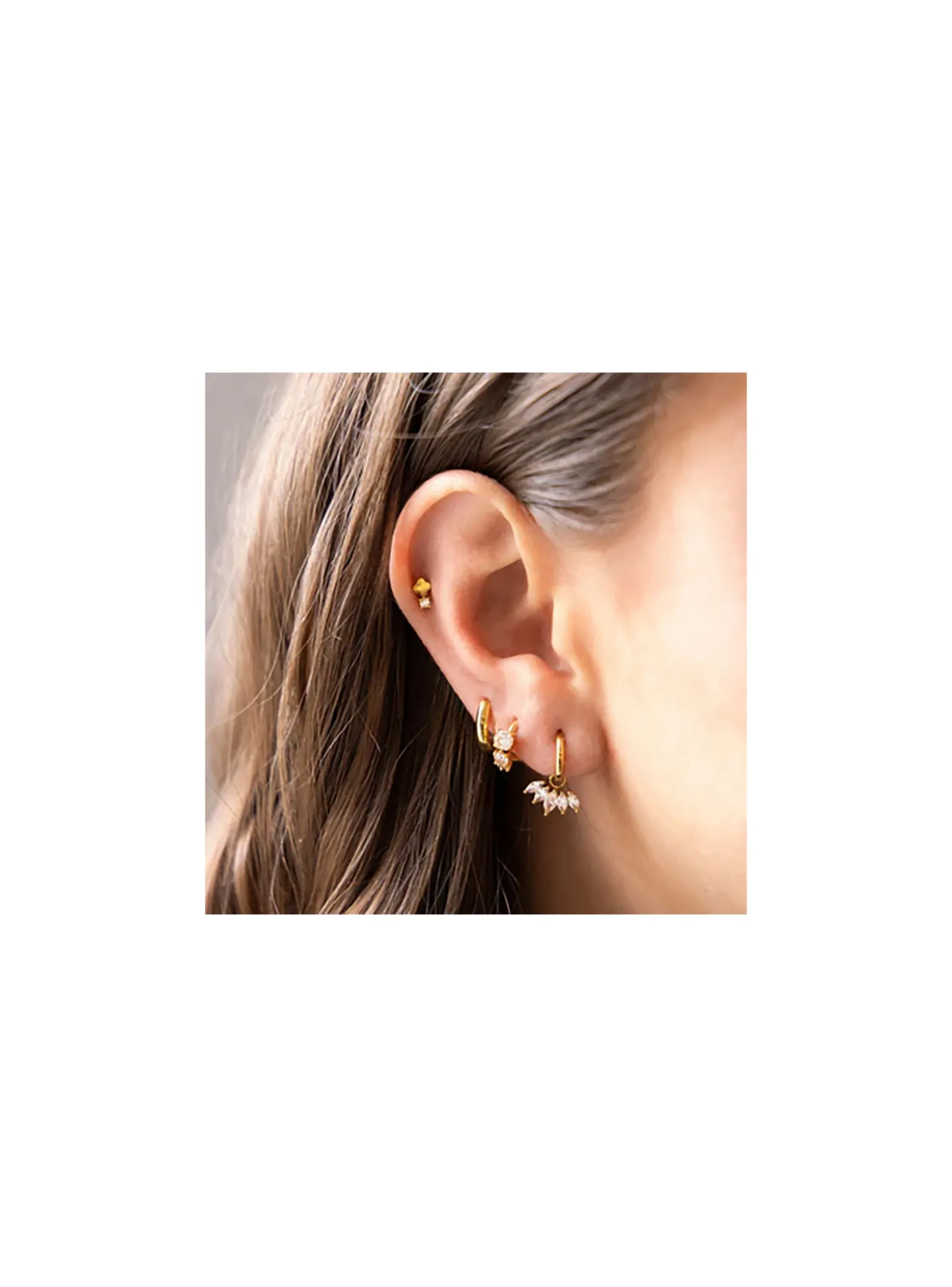 Piercing Zag Bijoux Hastings acier doré trèfle oxyde